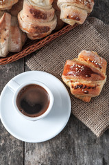 cup of coffee and croissants