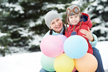 Mother with child boy son at winter