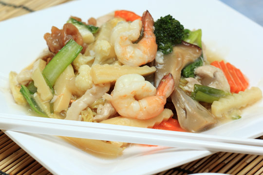 Chinese style stir fried yellow noodles with in gravy sauce