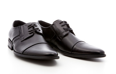 black, man's shoes on a white background