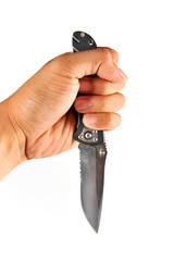 Fototapeta premium Hand is holding a kitchen knife isolated on a white background