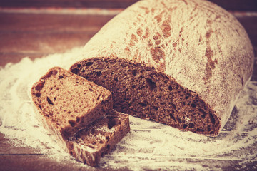 Delicious bread on a wood table