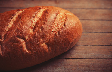 Delicious bread on a wood table