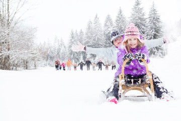 Fototapeta na wymiar Children on the snow