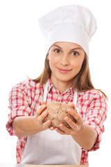 smiling woman chef holding dough in the hands