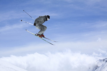 flying skier on mountains