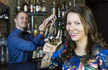 and the bartender girl near the bar