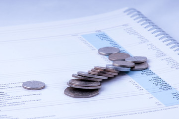 group balance sheet with coins