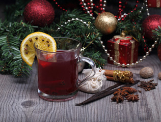 mulled wine with spice and christmas tree