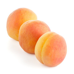Fototapeta na wymiar Three sweet peaches