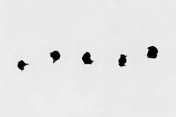 Holes on paper