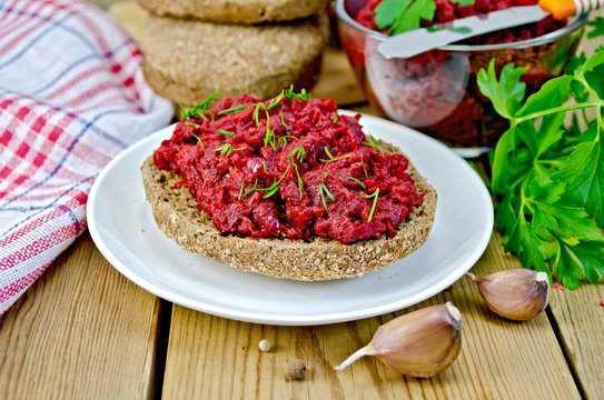 Sandwich with beet caviar on board