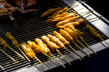 Pieces of grilled chicken on barbecue2