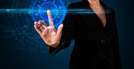 Young tech woman pressing high technology control panel screen c