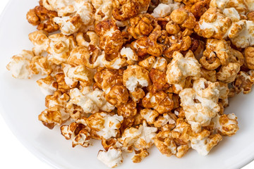 Popcorn on a white plate