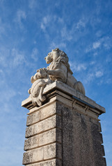 Fototapeta na wymiar Lion sculpture of a bridge (1868). Arles, France