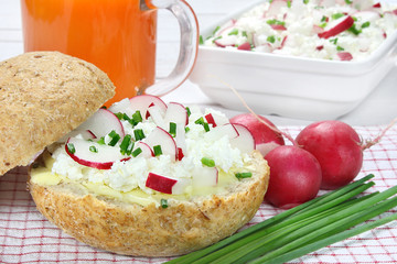 Bread roll with cottage cheese,radish and chives