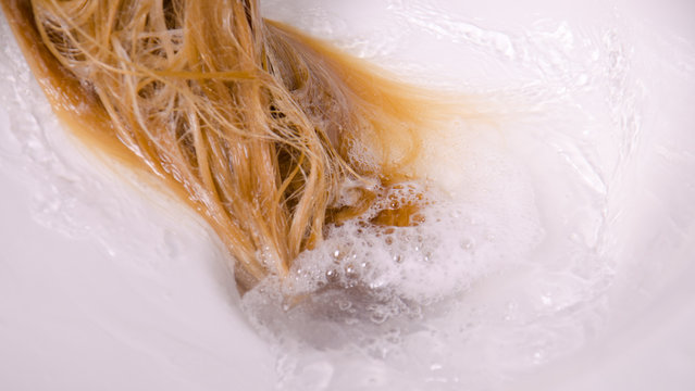 Hair In The Sink At Hairdresser Saloon.