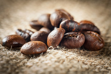 Coffee on grunge burlap background