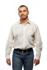 Fototapeta premium Handsome man in white shirt walking on white background