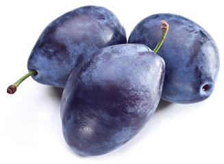 Three plums with leaf.