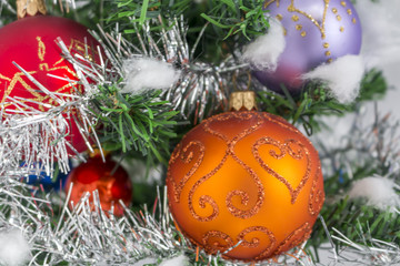 Christmas decoration with red golden balls and fir tree branches
