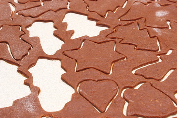 Dough for cookies in shape of christmas tree and star