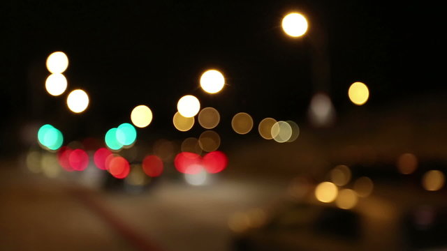 Background of blurred lights at night from cars in traffic
