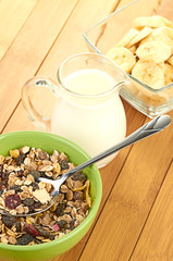 Delicious and healthy cereal in bowl with milk