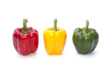 Red, yellow and green bell peppers isolated