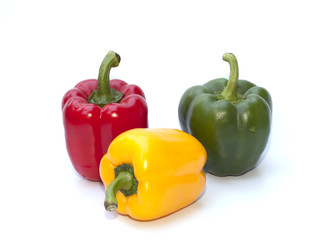 Red, yellow and green bell peppers isolated