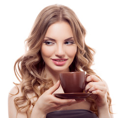 Naklejka premium beautiful young woman with cup of coffee, isolated on white