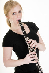 Pretty Blond Woman Playing Clarinet Musical Performance White