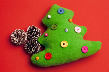 Toy Christmas Tree On Red Background