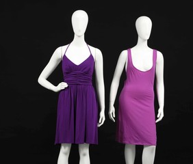 Two mannequin elegant dress and isolated on black background