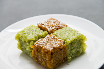 Glutinous rice cooked with sugar which coffee and pandan leaves