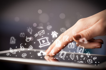 Finger pointing on tablet pc, social media concept