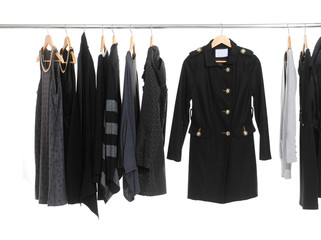 Female Variety of black clothes with coat hanging