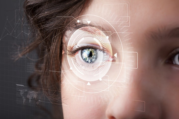 Cyber girl with technolgy eye looking