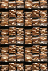Paper documents stacked in archive