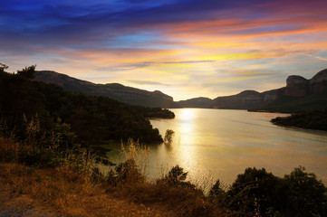 Fototapeta premium mountains lake in sunset. Sau reservoir