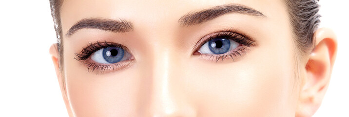 Naklejka premium Beautiful female eyes, white background
