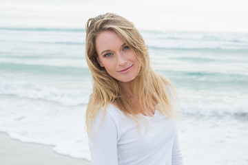 Portrait of a smiling casual woman at beach