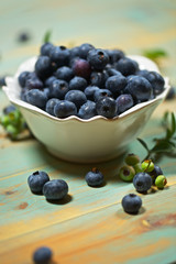 Fresh blueberry in a white bowl