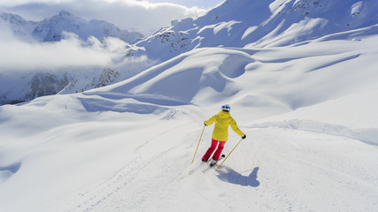 Ski, woman skiing downhill