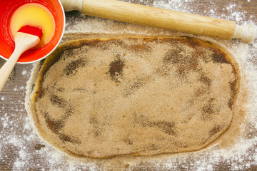 Cinnamon roll before rolling up