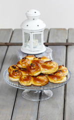 Traditional swedish bun in christmas setting. A saffron bun