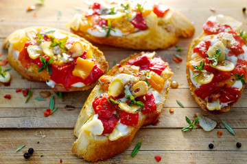 Bruschetta with roasted bell pepper, goat cheese and garlic