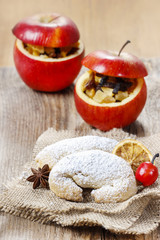 Christmas croissants and red apples stuffed with dried fruits