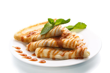 pancakes with syrup and mint